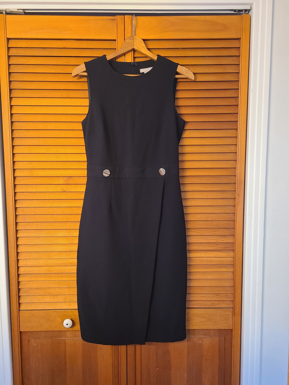 Classic Black Sleeveless Sheath Dress